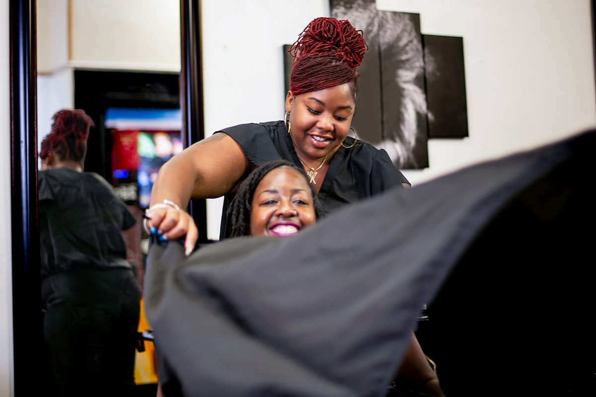 Stylist working with a client at the salon